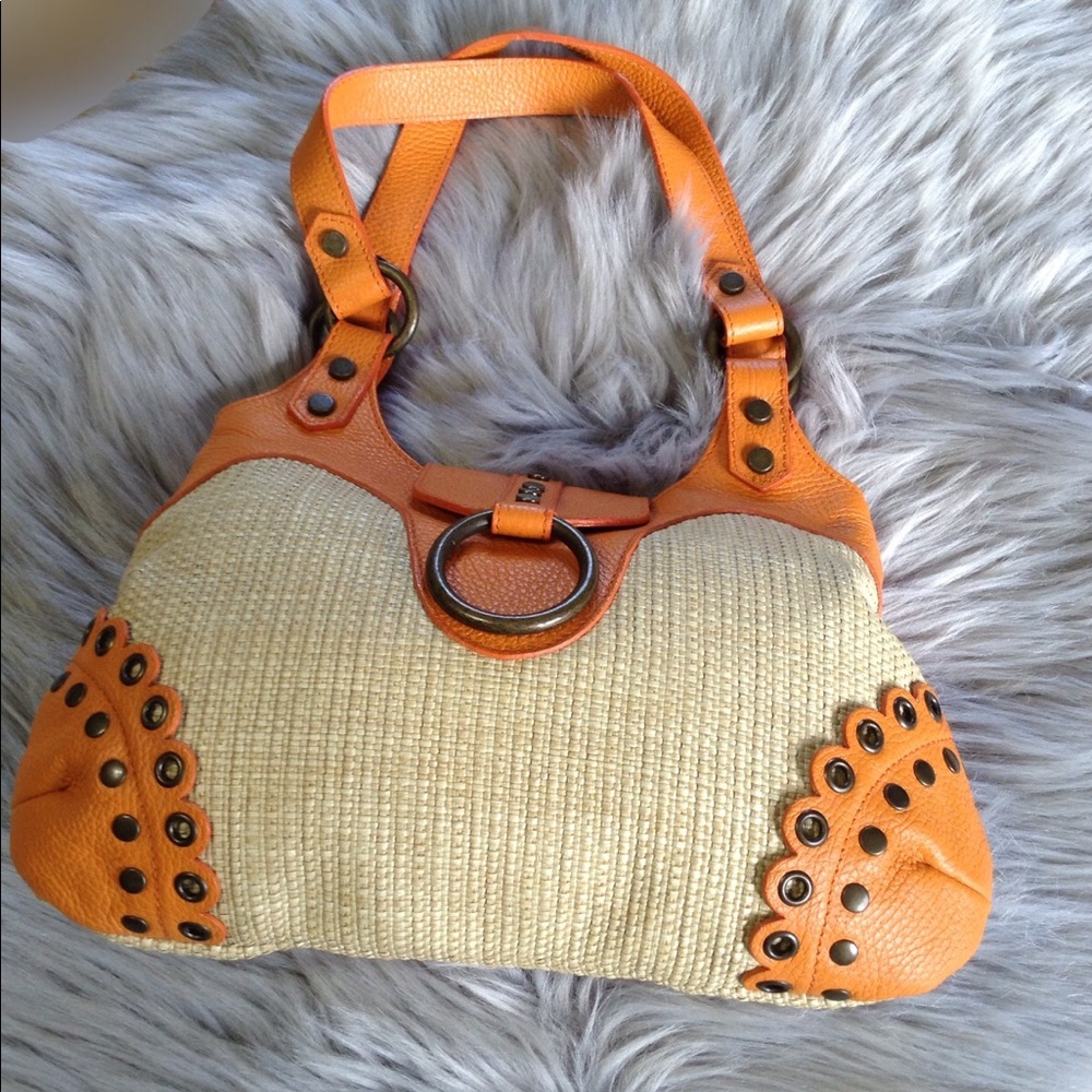 TANNER AUTHENTIC. Vintage leather with straw.